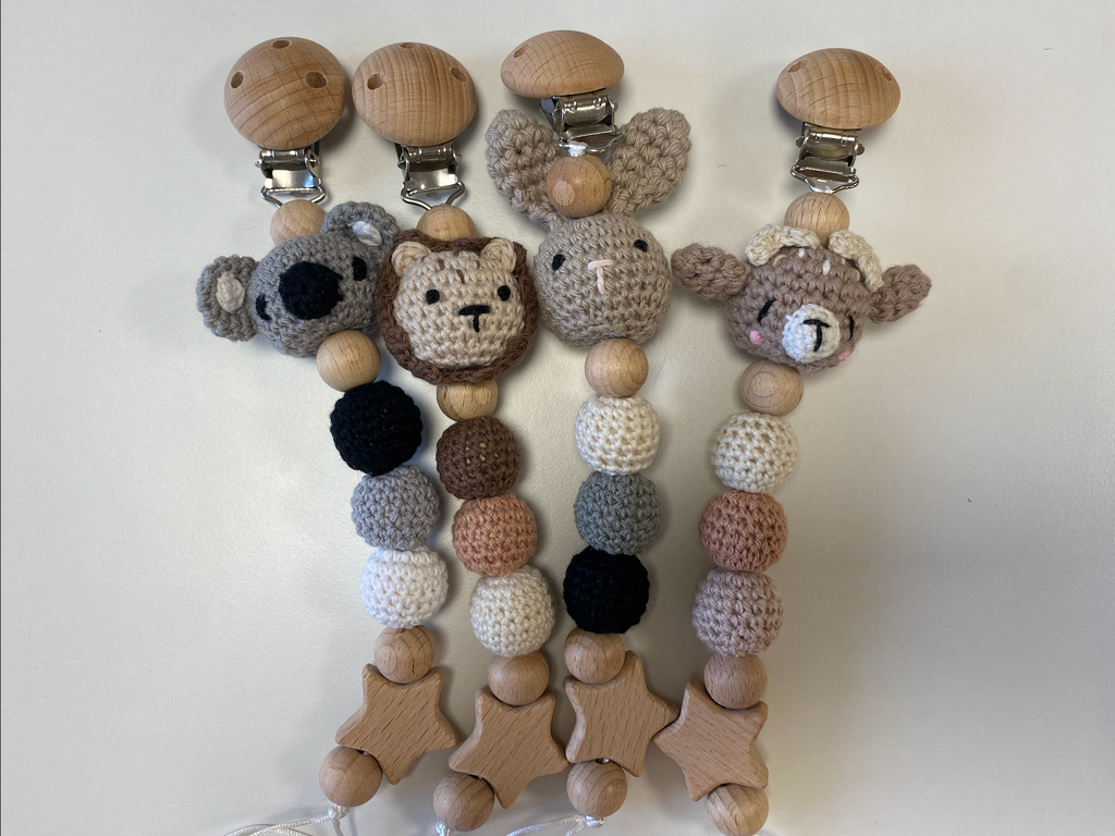 Tamborēts knupīša turētājs
