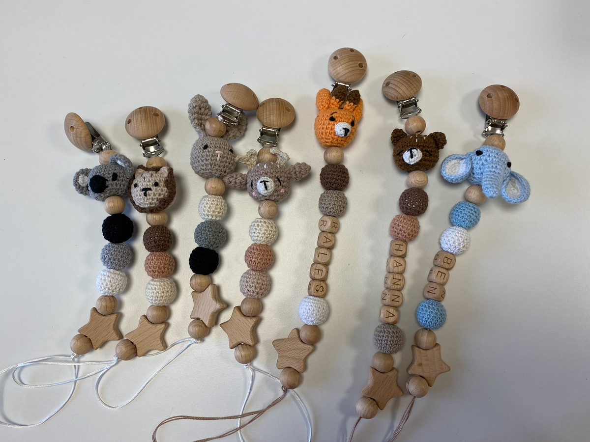 Tamborēts knupīša turētājs