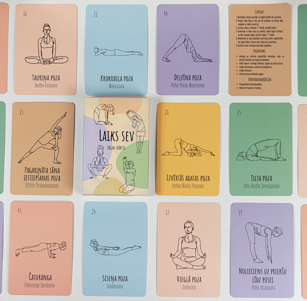 A grid of illustrated yoga cards in pastel colors, showing different poses with black line drawings and some cards containing text instructions in Latvian.